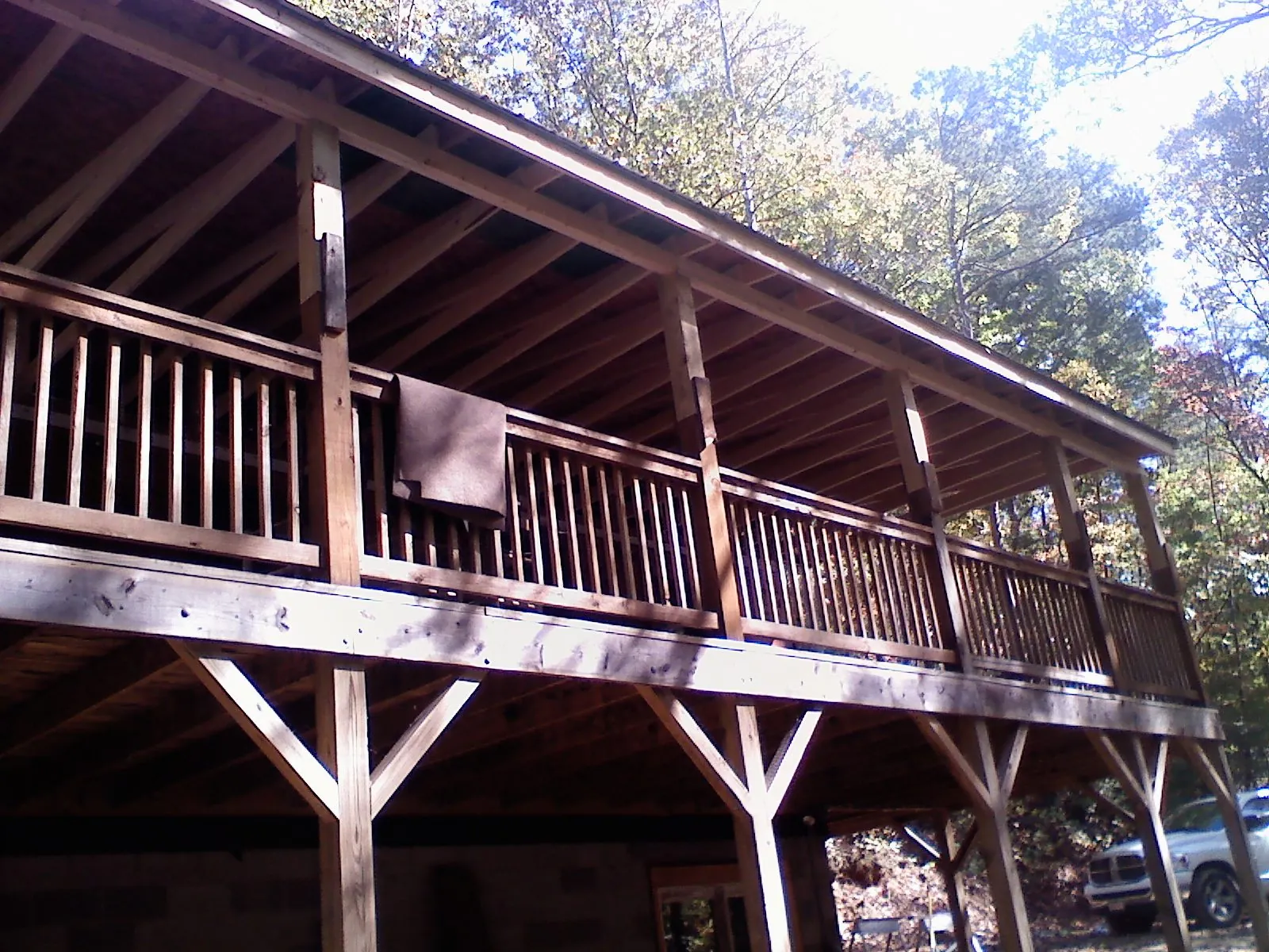 Timber framing under a new elevated porch and deck — Roof Leak Repair in North Newton by Roofing Brothers